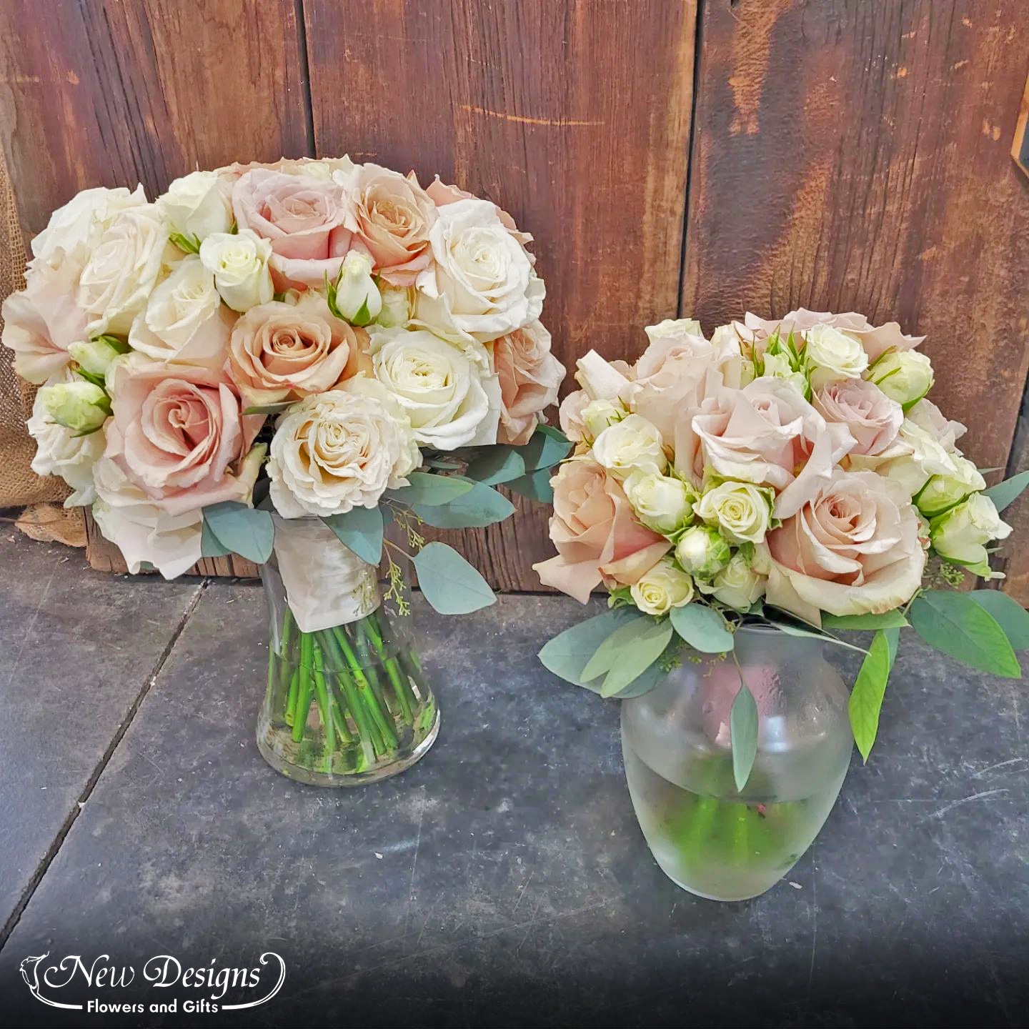 A large Bridal Bouquet, with Cream, Dusty Pink, and Nude Coloured Roses, and a Similar bouquet on a smaller scale for the bridesmaid. Both accented with Silver dollar eucalyptus